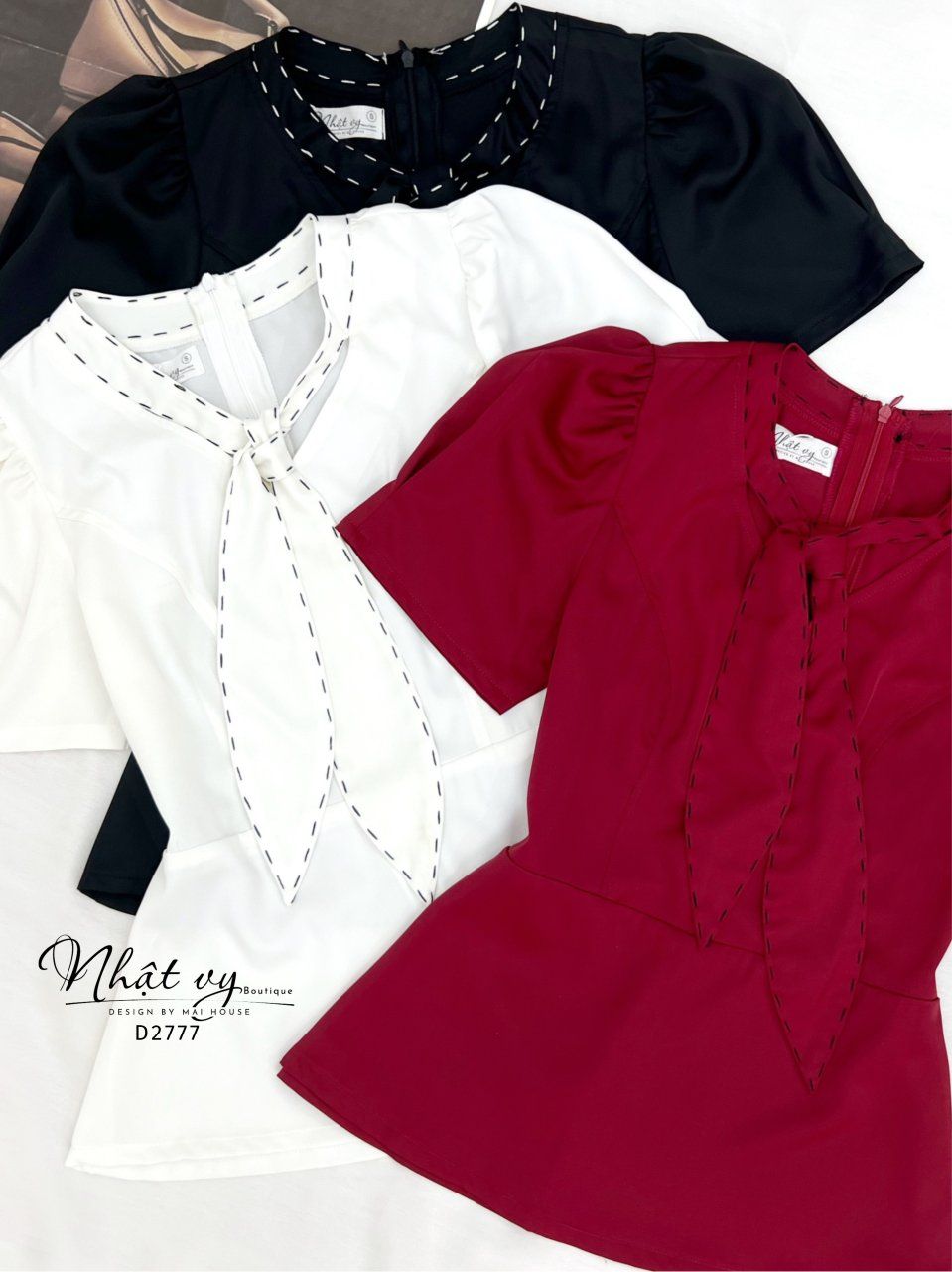  Áo peplum thắt nơ viền chỉ nổi - D2777 