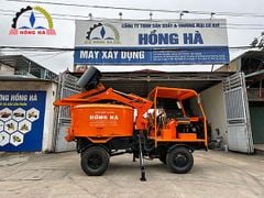 Xe trộn bê tông tự cấp liệu Hồng Hà 18 bao 2 cầu