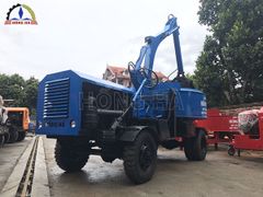 Xe trộn bê tông tự cấp liệu 12 bao 2 cầu Hồng Hà