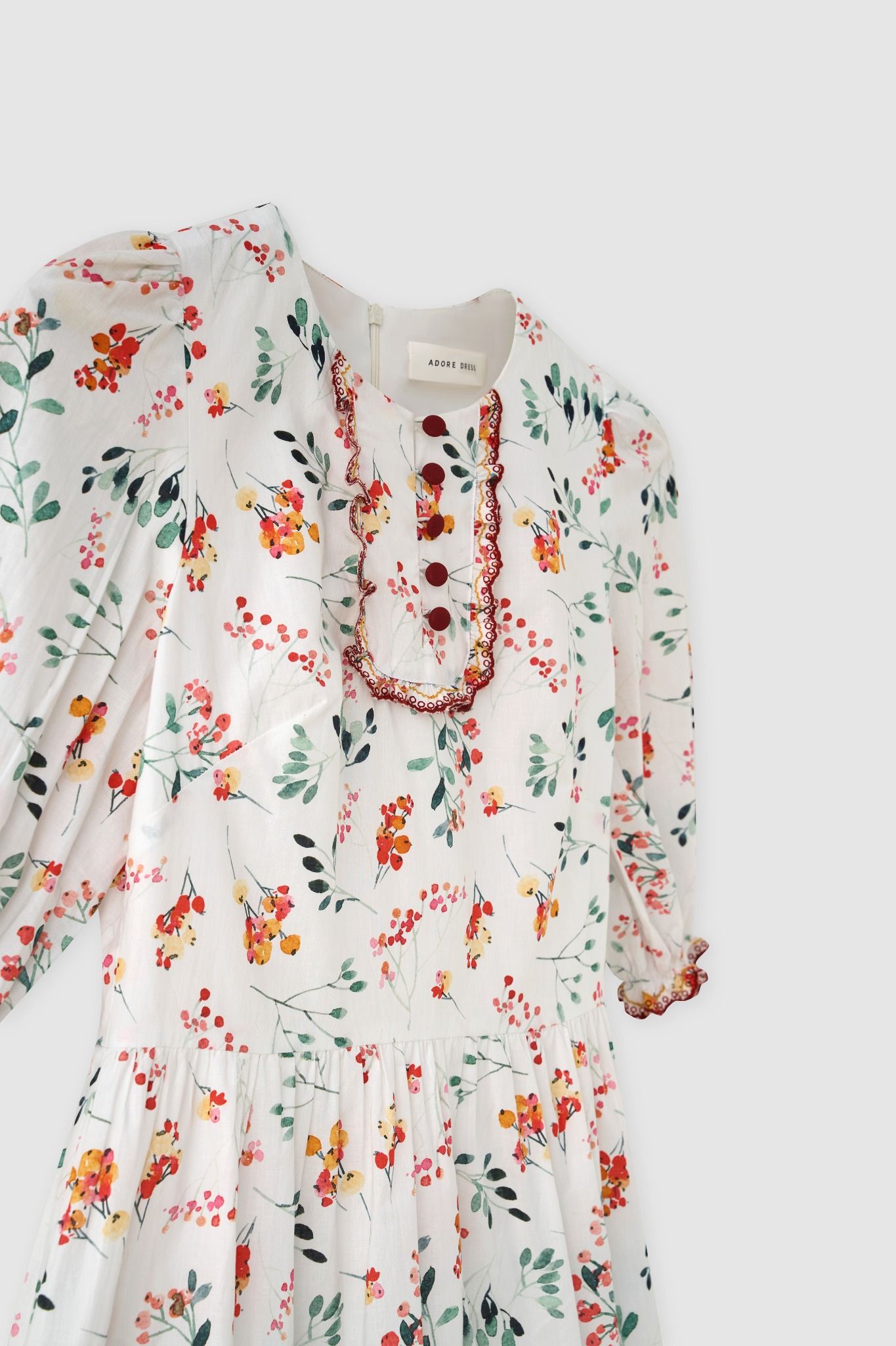Đầm mini tunic thô lụa hoa nhỡ nối tầng