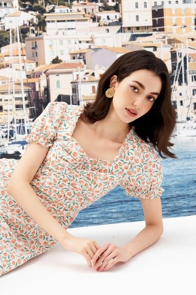 Đầm midi feminine thô lụa hoa nhỡ cam