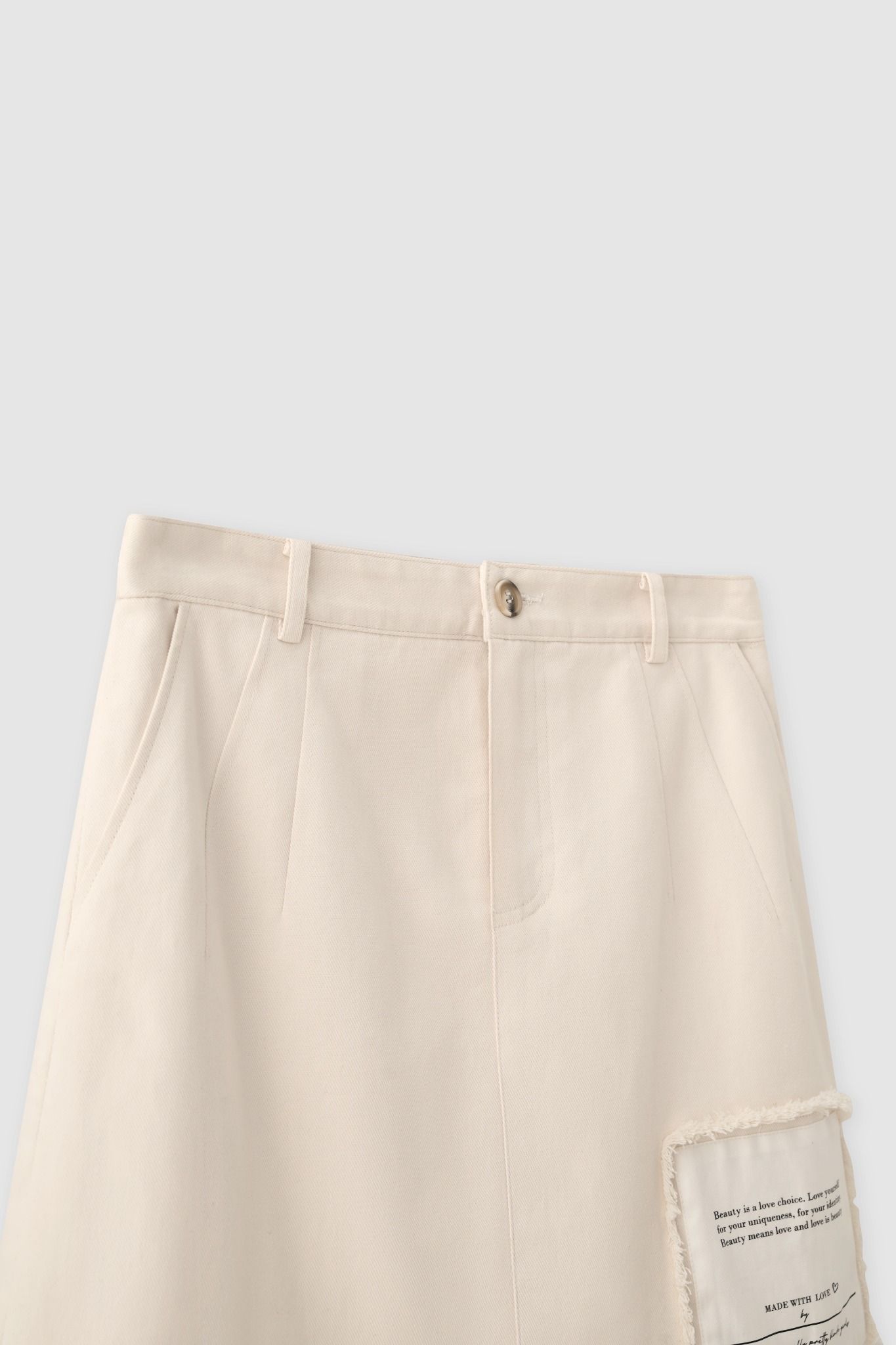 Chân váy mini casual khaki cream in gấu