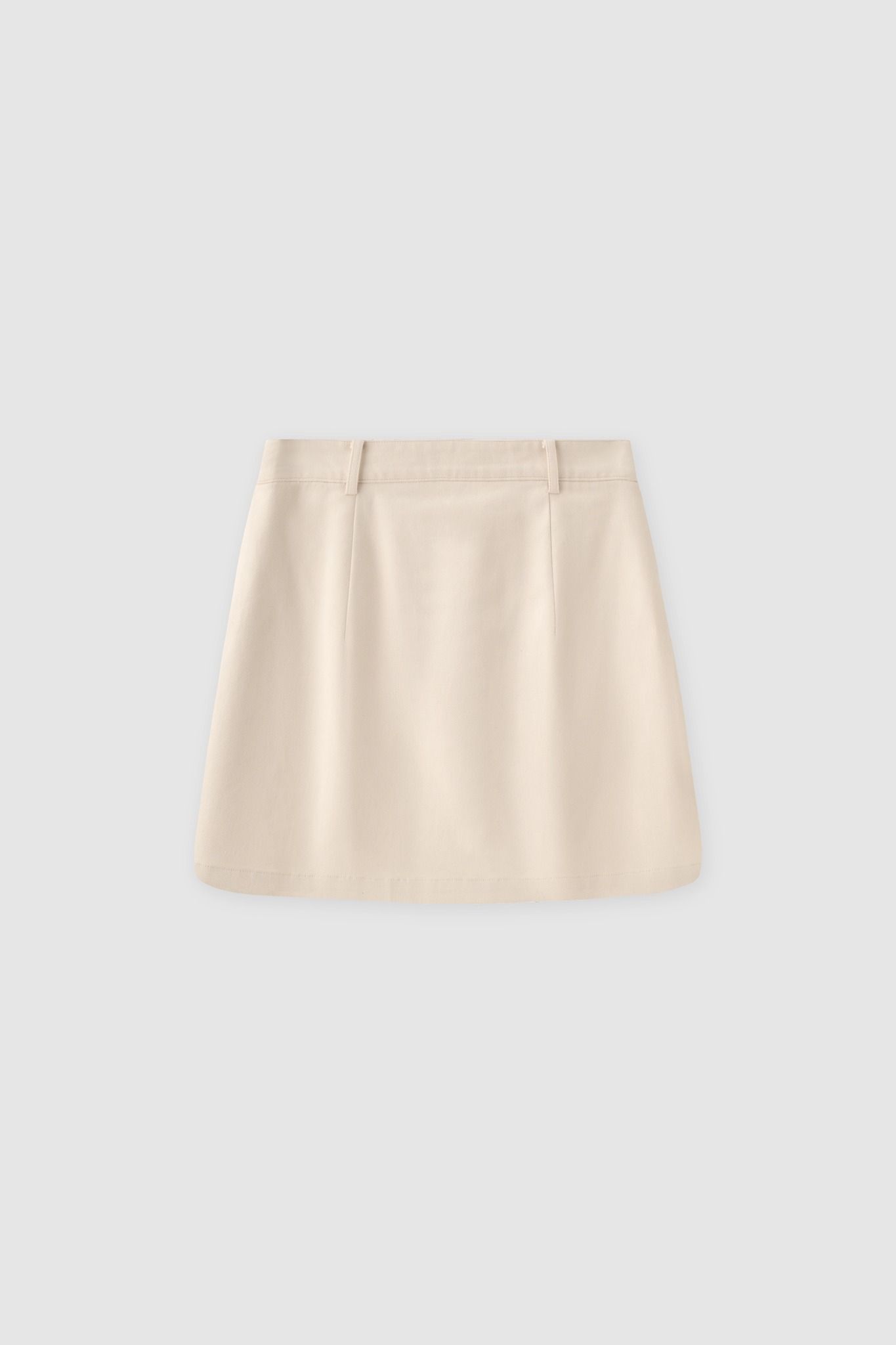 Chân váy mini casual khaki cream in gấu