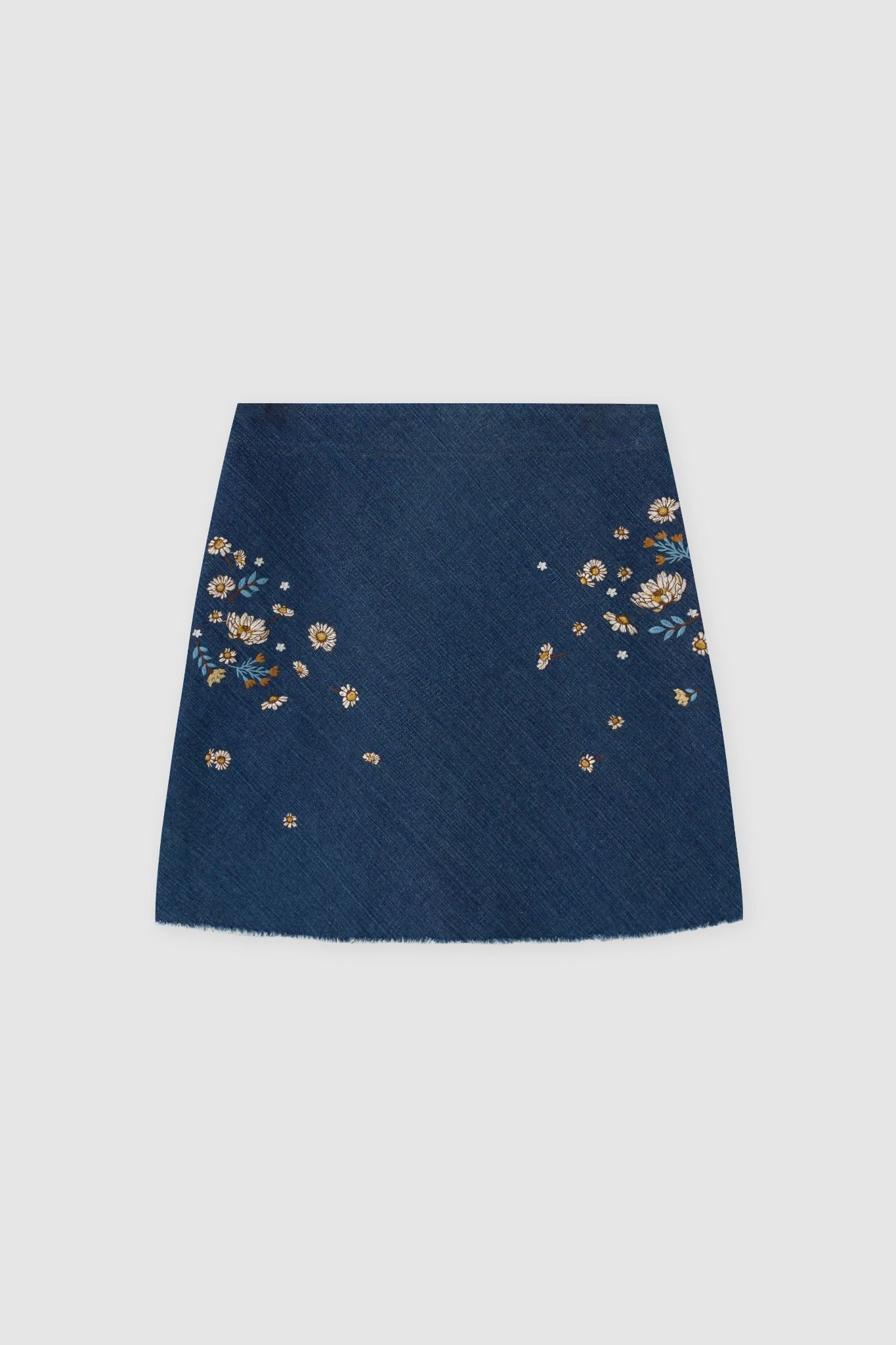 Chân váy mini casual denim xanh chàm thêu 2 bên