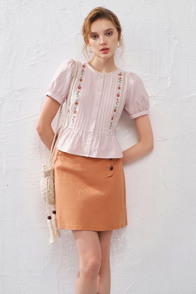 Chân váy mini thô kaki cam khuy kim loại