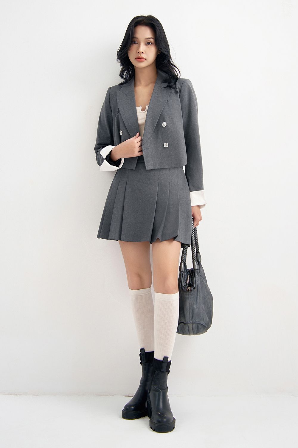 Chân váy mini xoè xếp ly solid tàn đậm