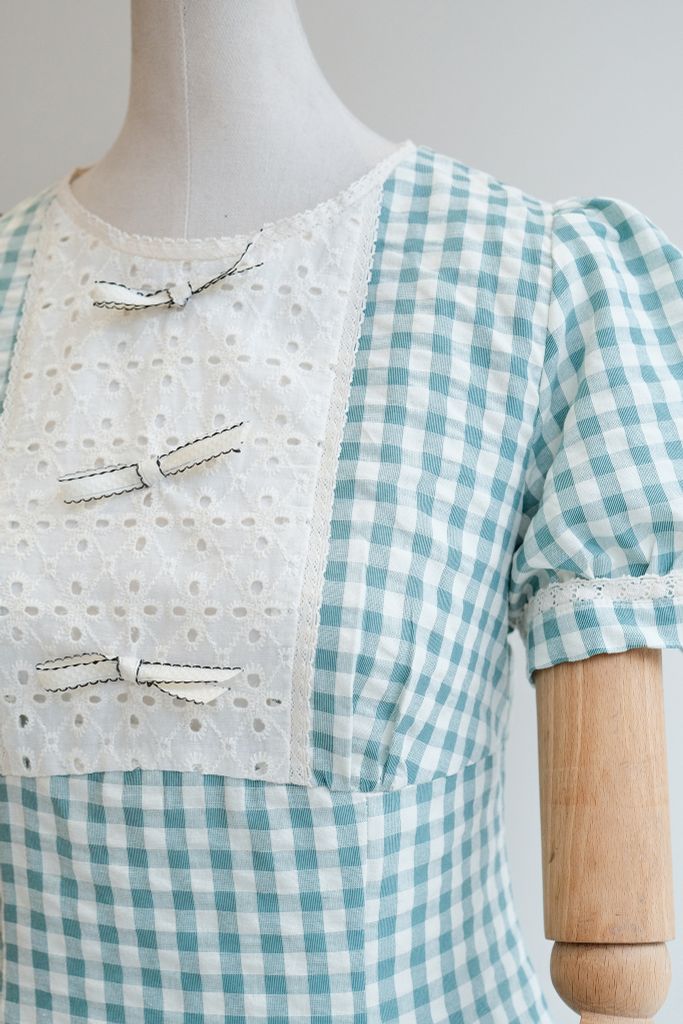 Đầm mini đũi mềm karo xanh ngọc phối cổ nơ