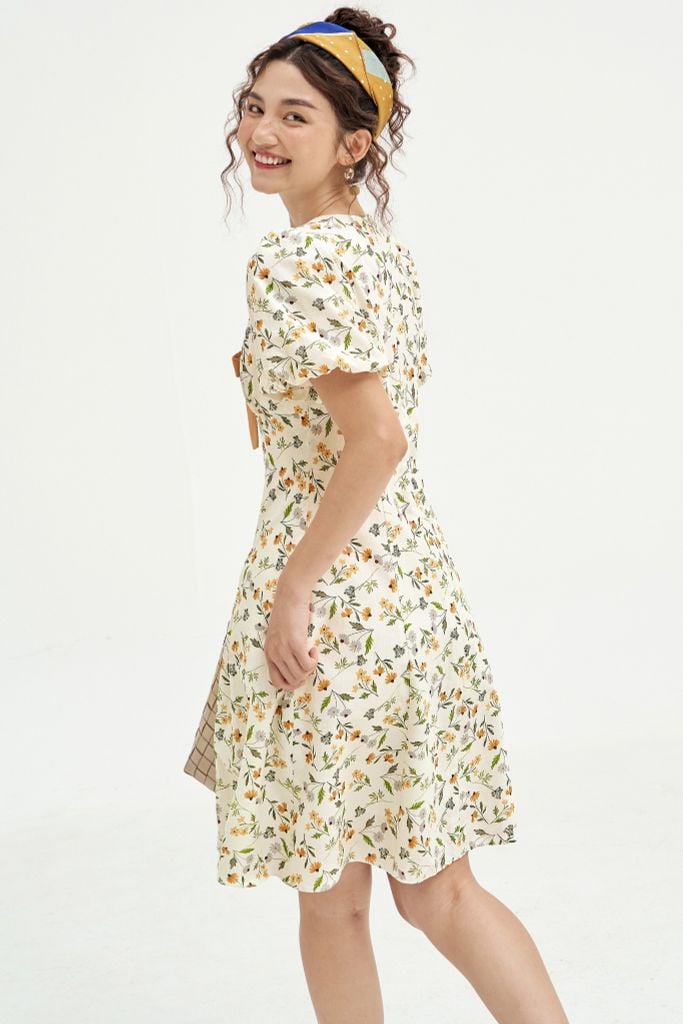 Đầm mini thô lụa hoa daisy vàng nơ cổ