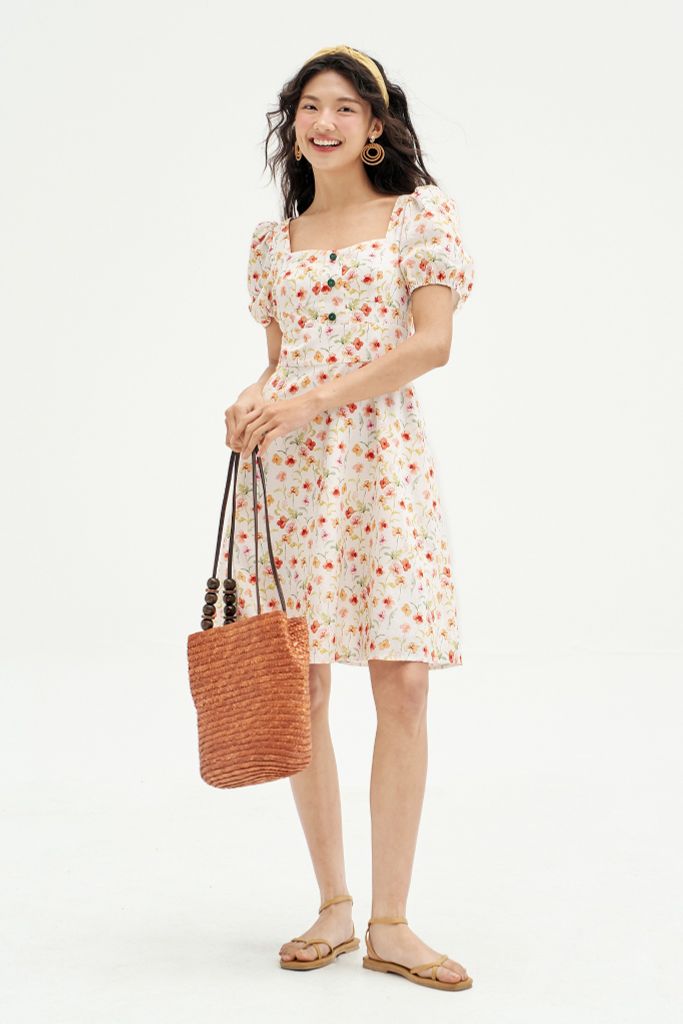 Đầm mini thô hoa nhí cam vàng