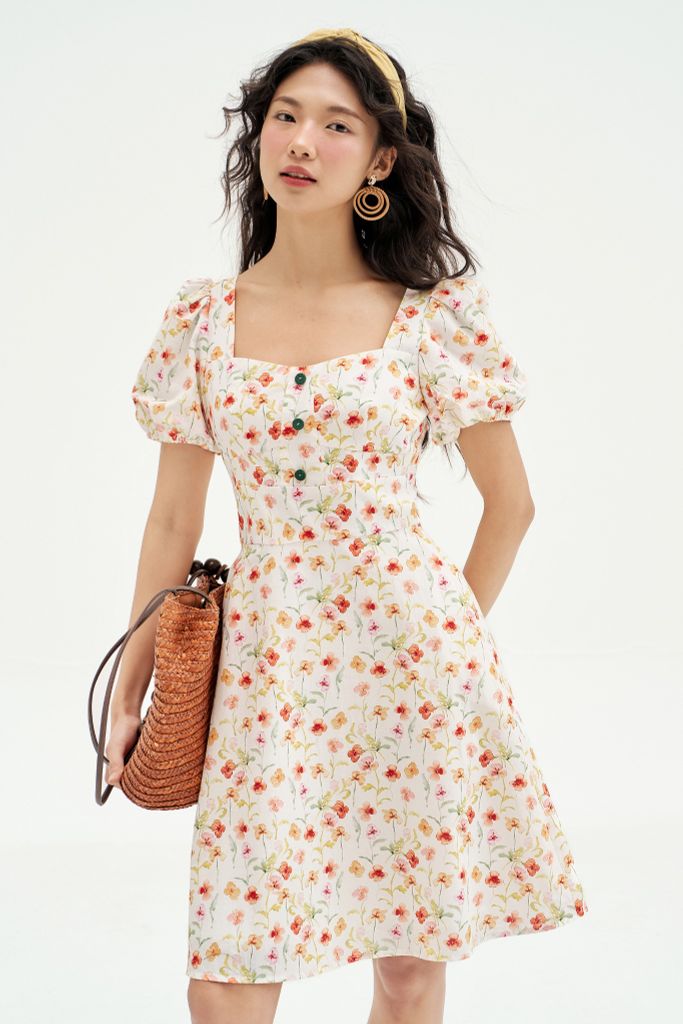 Đầm mini thô hoa nhí cam vàng