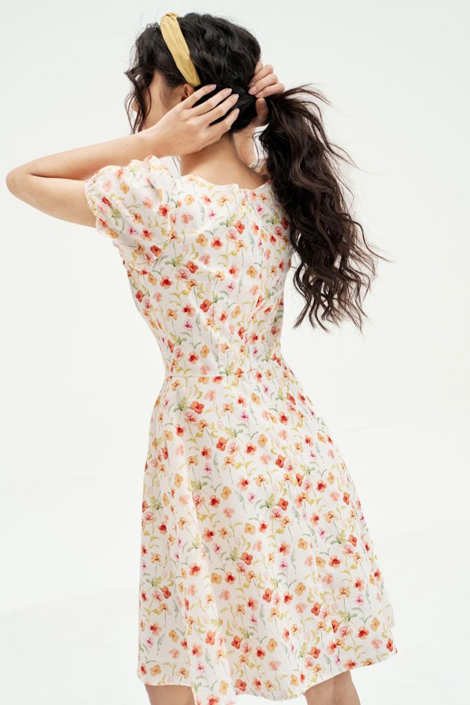 Đầm mini thô hoa nhí cam vàng