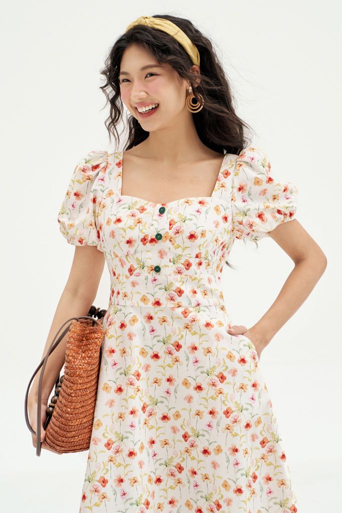 Đầm mini thô hoa nhí cam vàng