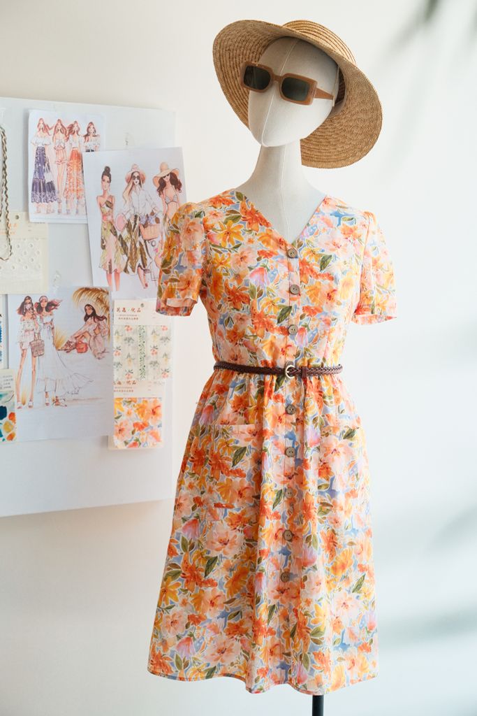 Đầm mini hoa cam loang nước