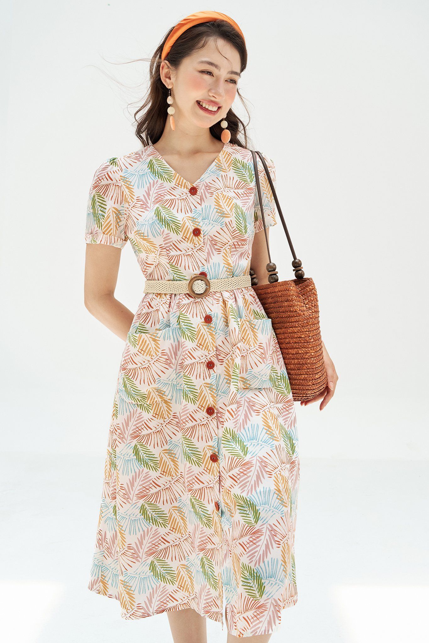 Đầm midi thô lụa lá tropical túi ốp