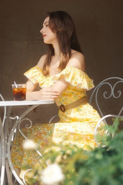 Đầm maxi thô hoa vàng bèo vai