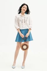 Chân váy mini xoè poly xốp xanh đính nơ