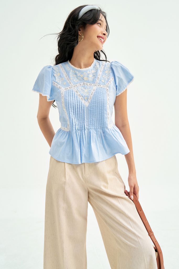 Peplum xanh thêu phối ren trắng