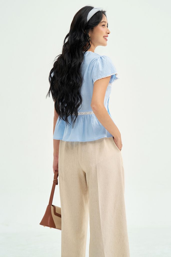 Peplum xanh thêu phối ren trắng