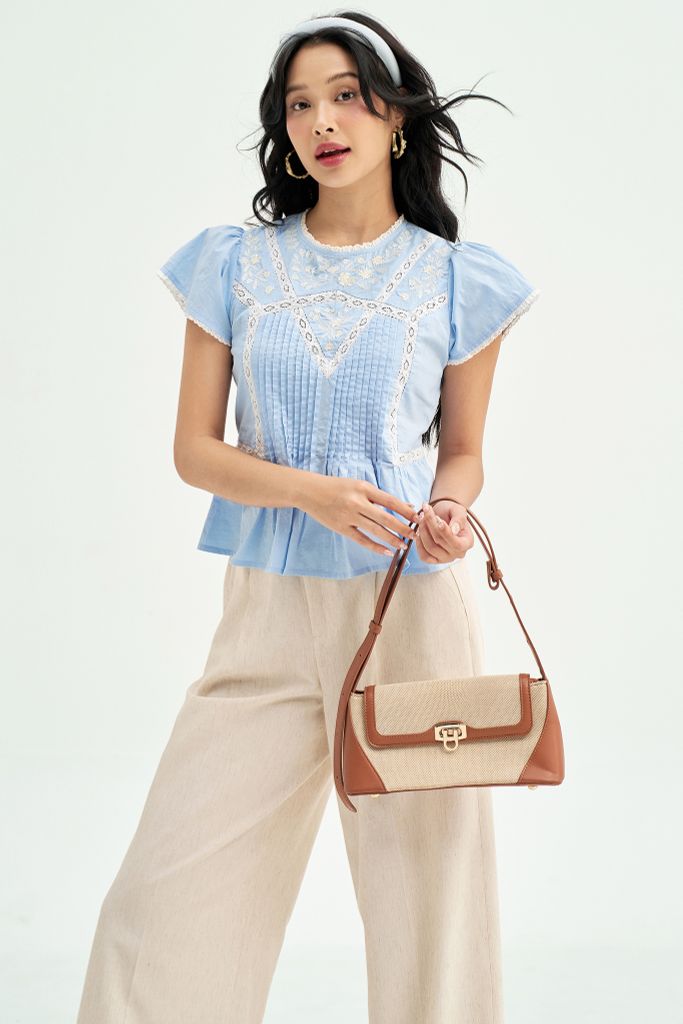 Peplum xanh thêu phối ren trắng