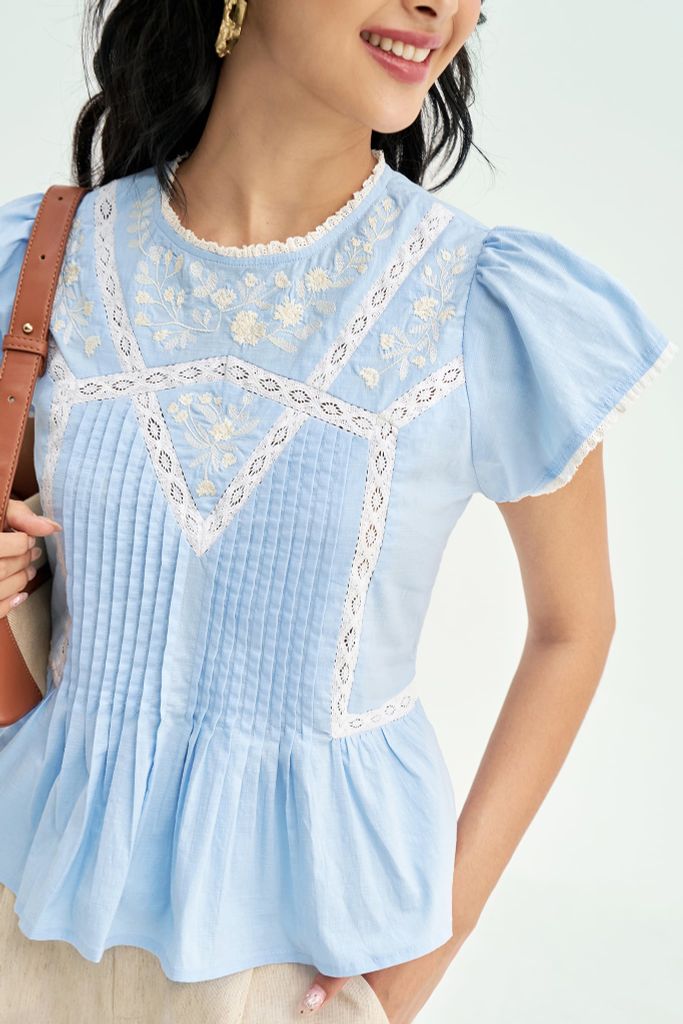 Peplum xanh thêu phối ren trắng