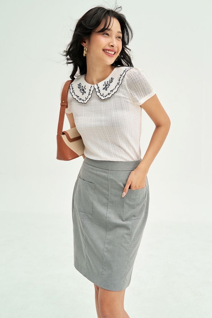 Chân váy mini túi ốp basic tàn sáng