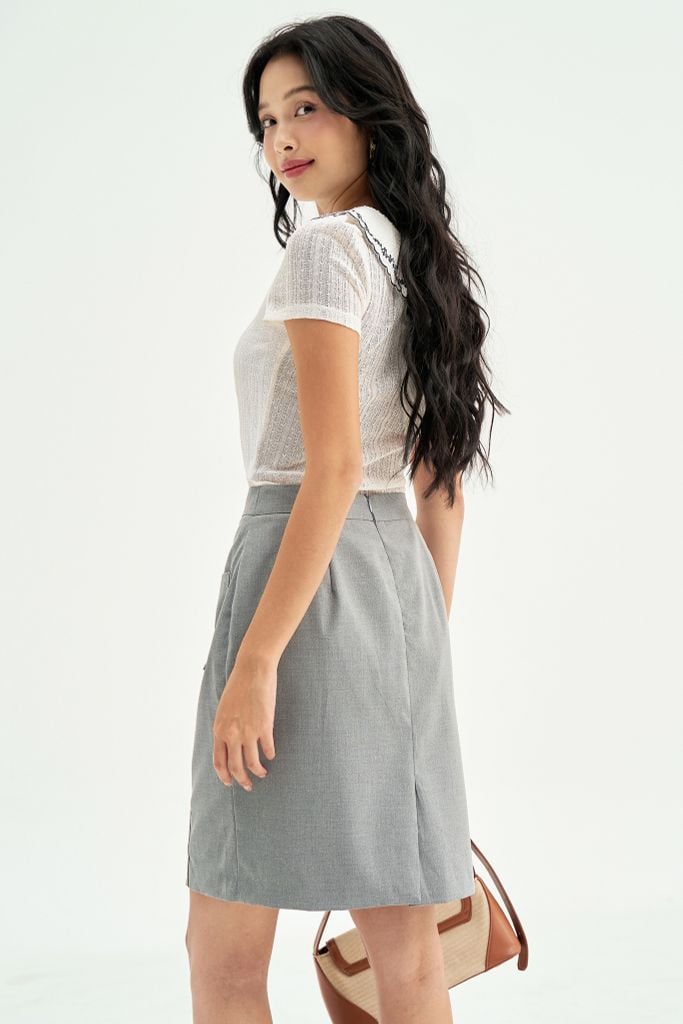 Chân váy mini túi ốp basic tàn sáng
