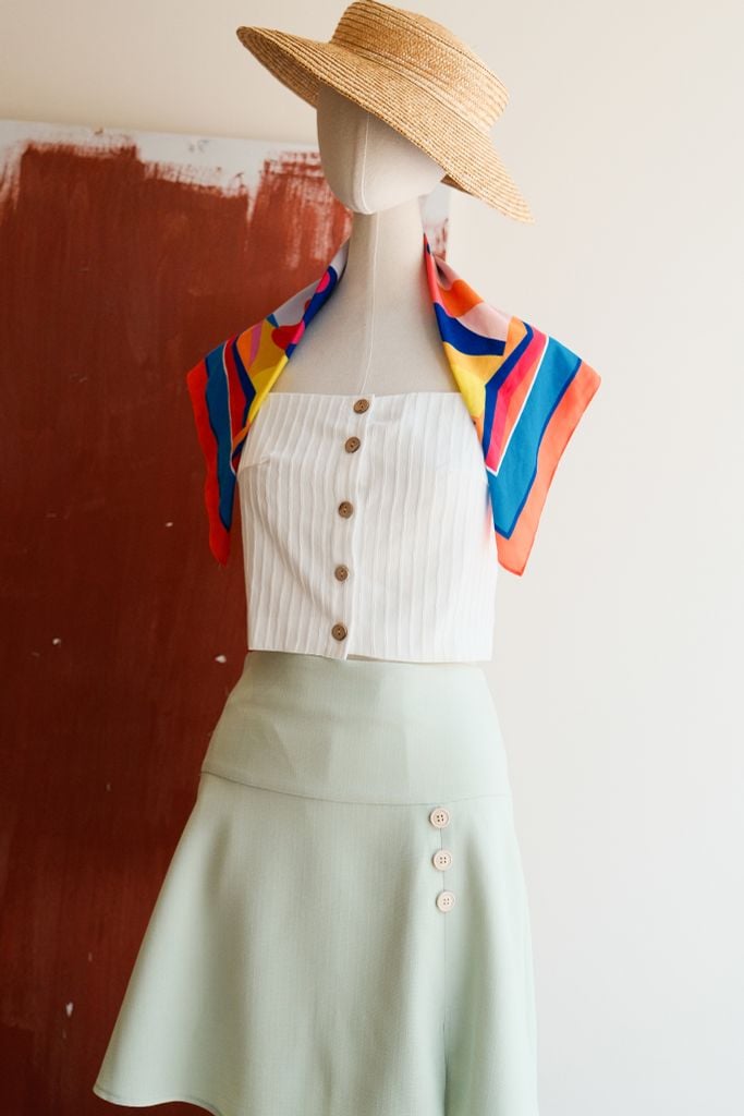 Chân váy mini tech xanh mint đính nơ