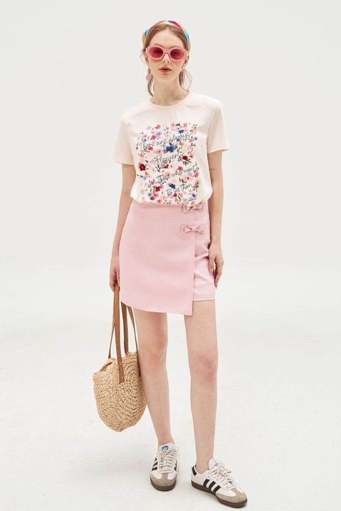 Chân váy mini A tech hồng kem đính nơ