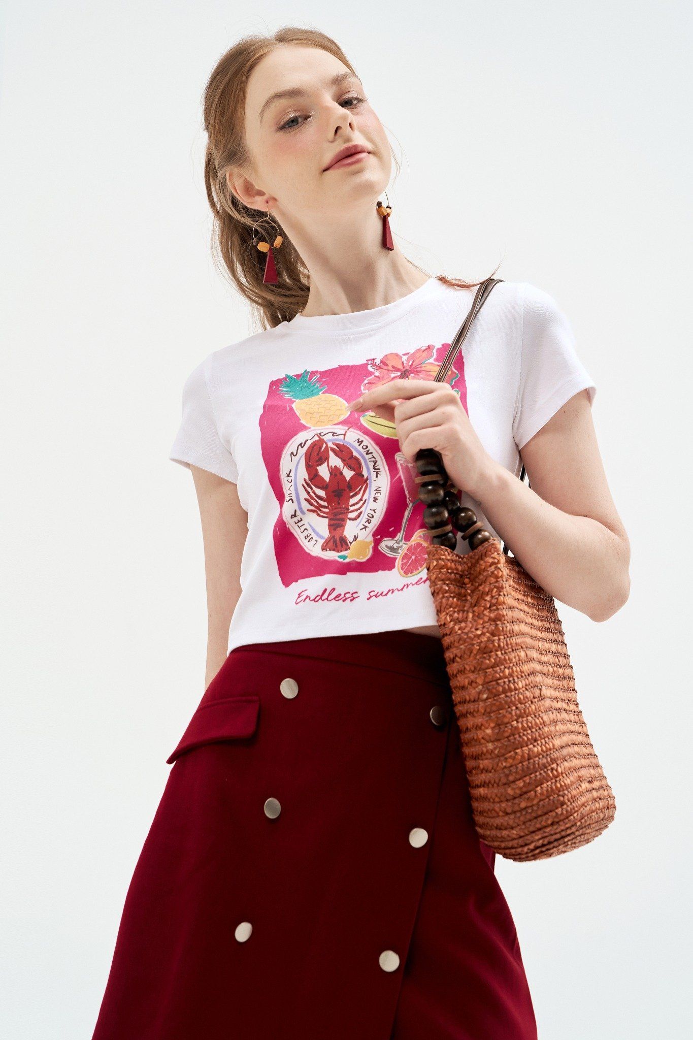 Baby Tee trắng in tropical items