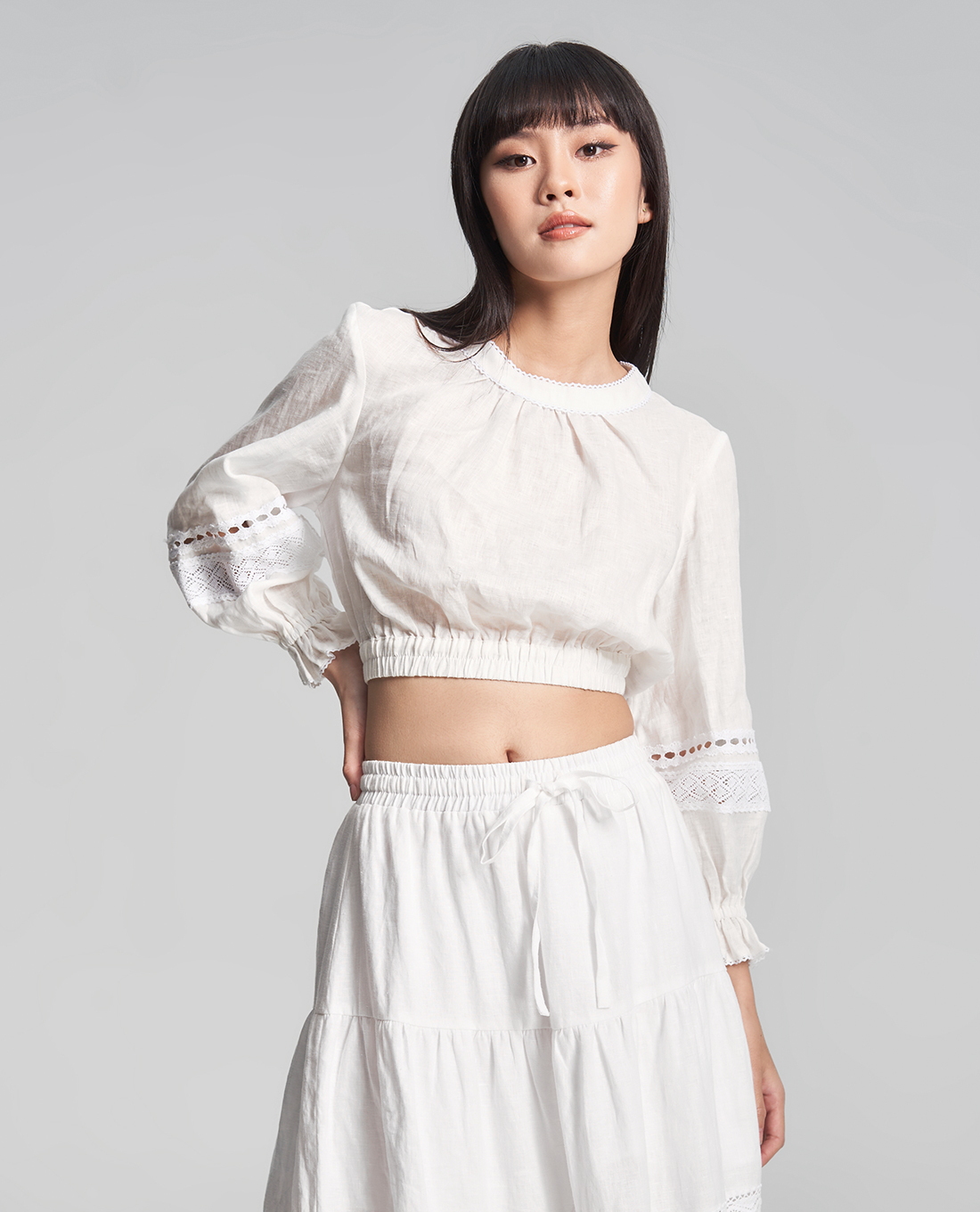 GIGI - Áo croptop nữ tay dài cổ tròn hiện đại