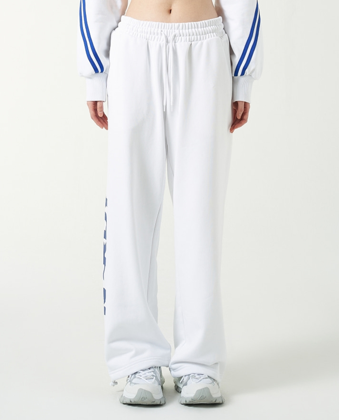 NERDY - Quần dài unisex ống rộng lưng thun Vertical Logo