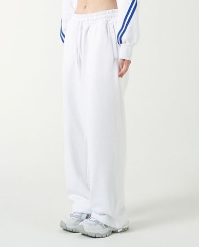  NERDY - Quần dài unisex ống rộng lưng thun Vertical Logo 