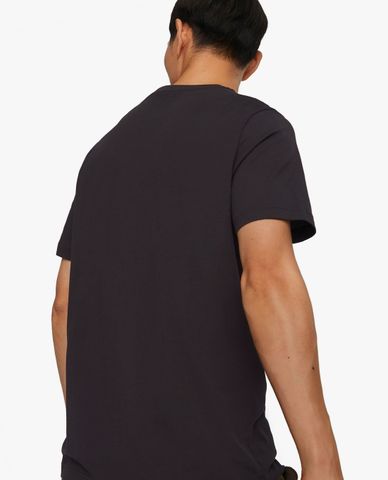  PUMA - Áo thun nam cổ tròn tay ngắn Graphics Court 