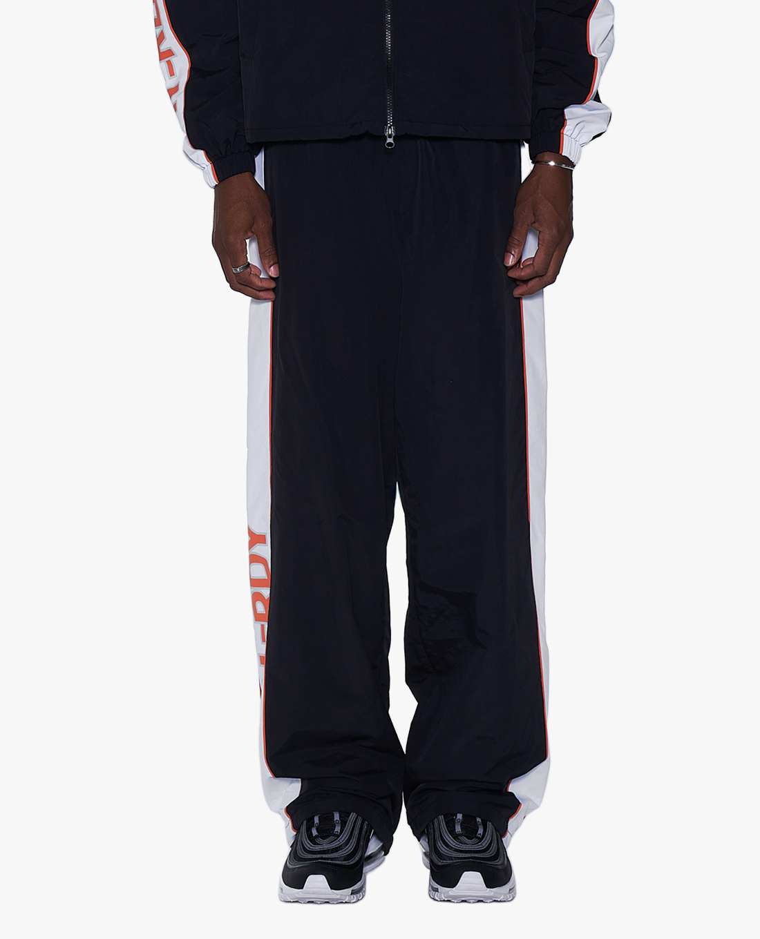 NERDY - Quần dài unisex ống rộng lưng thun Line Woven