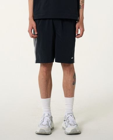  NERDY - Quần shorts unisex ống rộng lưng thun NY Woven Half 