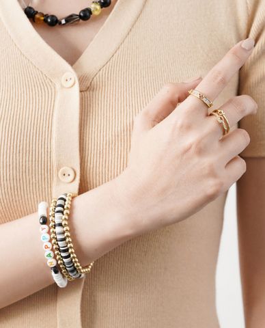  CECI - Nhẫn nữ dáng hở hai vòng phối trái tim và thắt nút thời trang 