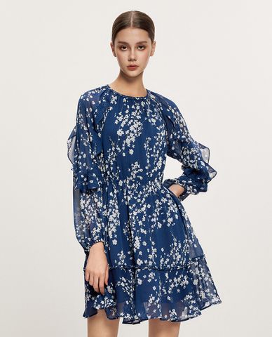  GIGI - Đầm xếp tầng mini cổ tròn tay dài phối hoa nhí điệu đà 