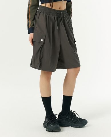  NERDY - Quần short unisex ống rộng lưng thun Cargo Woven 