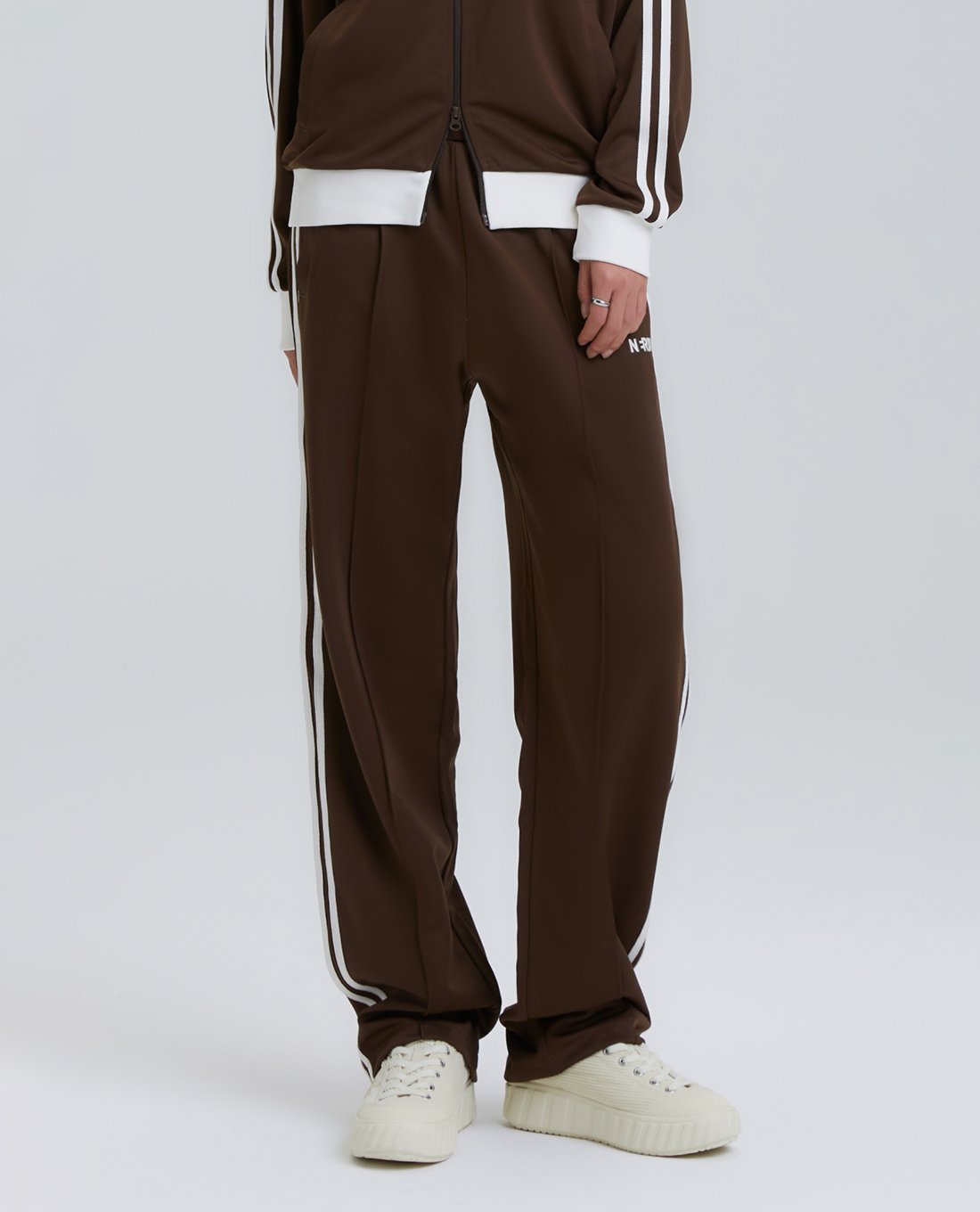 NERDY - Quần dài unisex ống rộng lưng thun Classic Ny Track