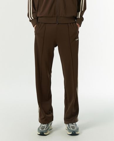  NERDY - Quần dài unisex ống rộng lưng thun Embroidered Logo NY Track 