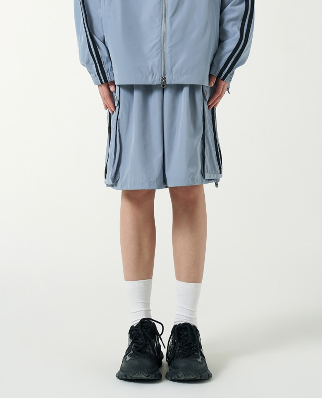 NERDY - Quần short unisex ống rộng lưng thun Cargo Woven