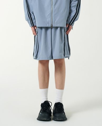  NERDY - Quần short unisex ống rộng lưng thun Cargo Woven 