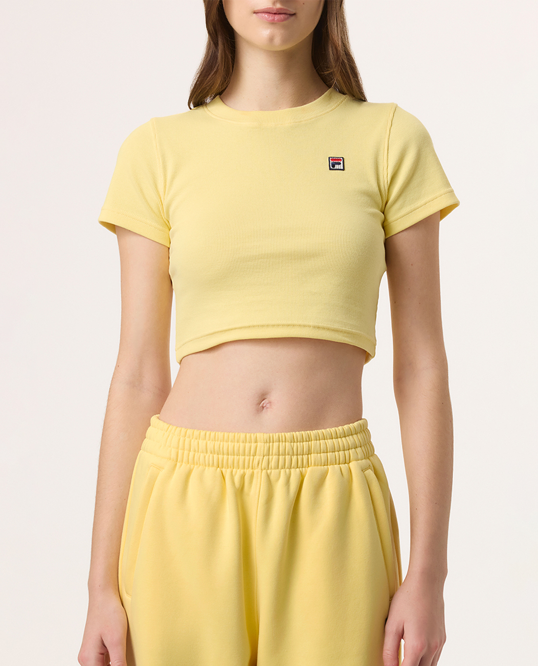 FILA - Áo croptop nữ Hailey Bieber