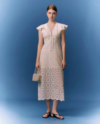  GIGI - Đầm sát nách midi cổ V phối hoa văn thắt nơ 