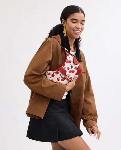  COACH - Túi đeo vai nữ phom bán nguyệt Hamptons 