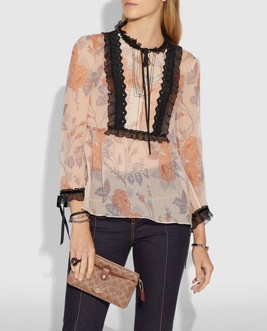  COACH - Ví cầm tay nữ Noa Pop Up Messenger 