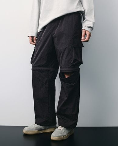  URBAN REVIVO - Quần nam ống rộng phối túi hộp hiện đại 