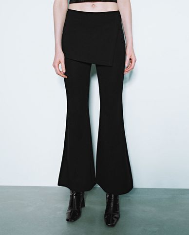  URBAN REVIVO - Quần nữ ống loe phối chân váy mini cá tính 