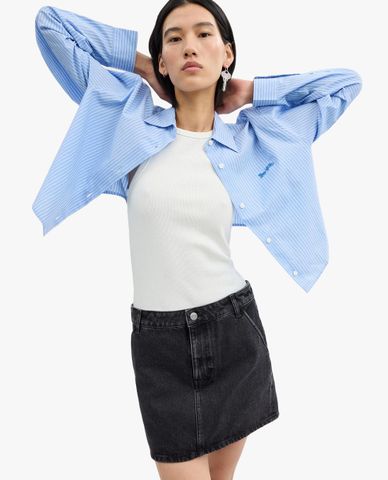  COACH - Chân váy denim dáng chữ A mini thời thượng 