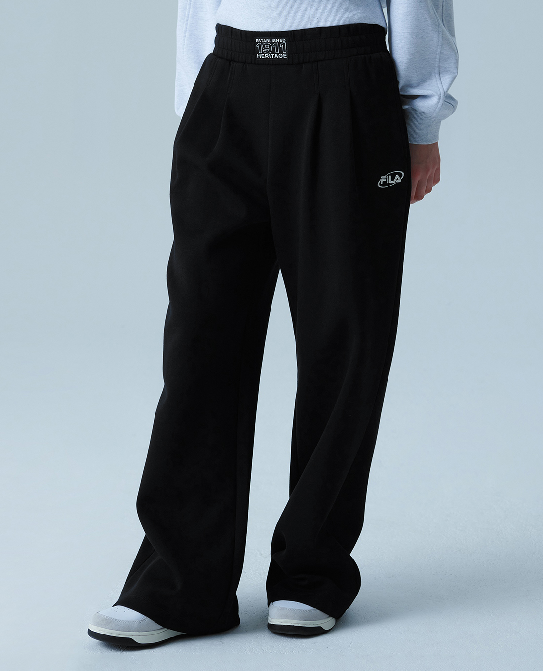 FILA - Quần dài nữ ống rộng lưng thun Heritage